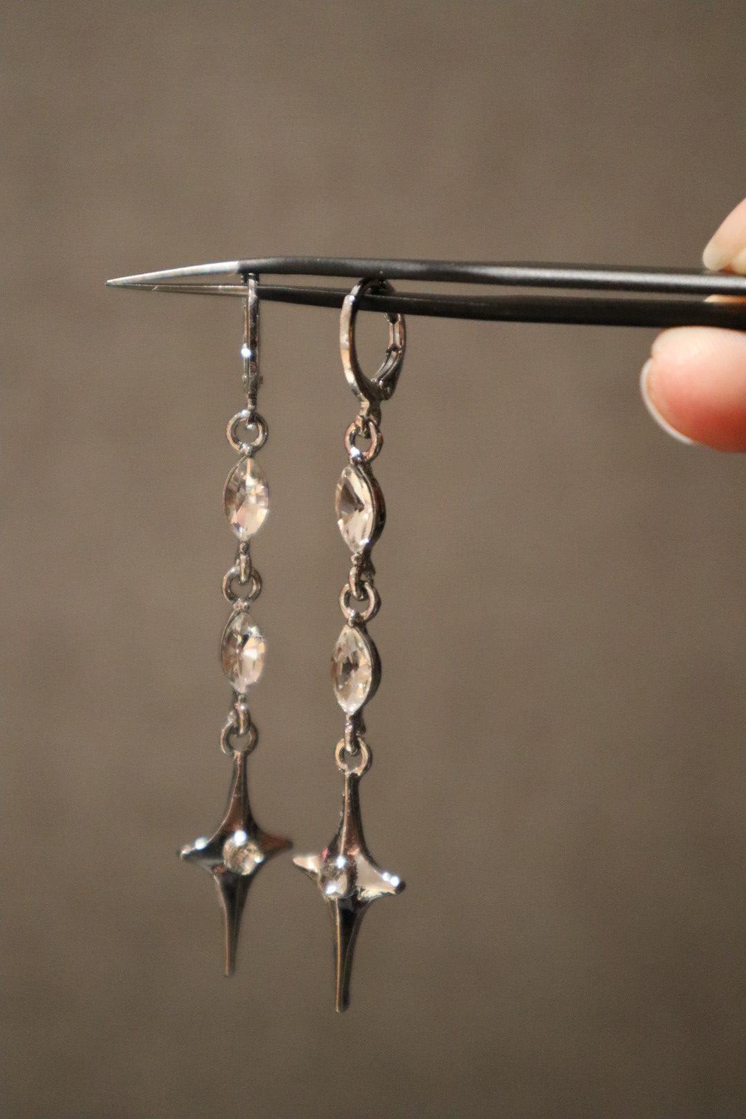 Silver Stellar Drop Earrings